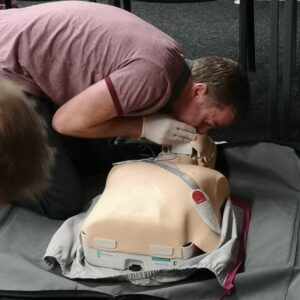 Man learning to give first aid